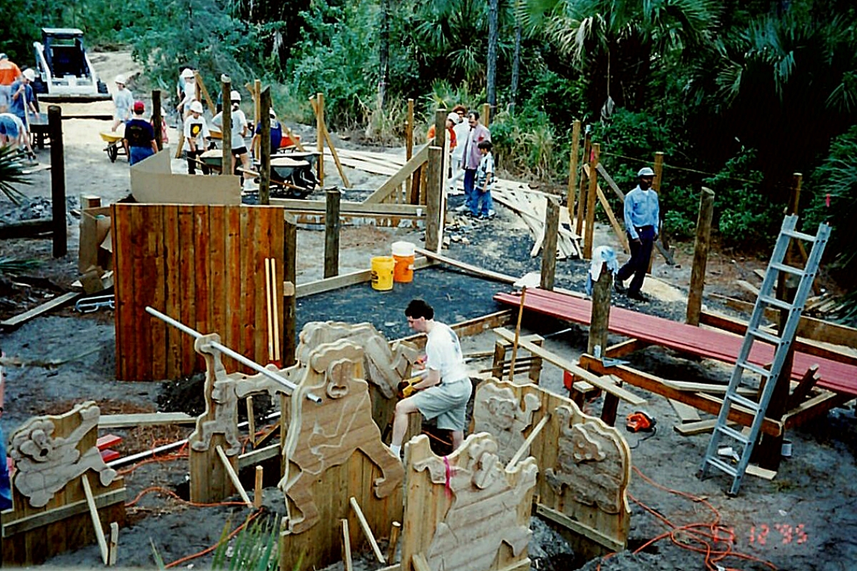 Volunteers building the Sugar Sand Park science playground