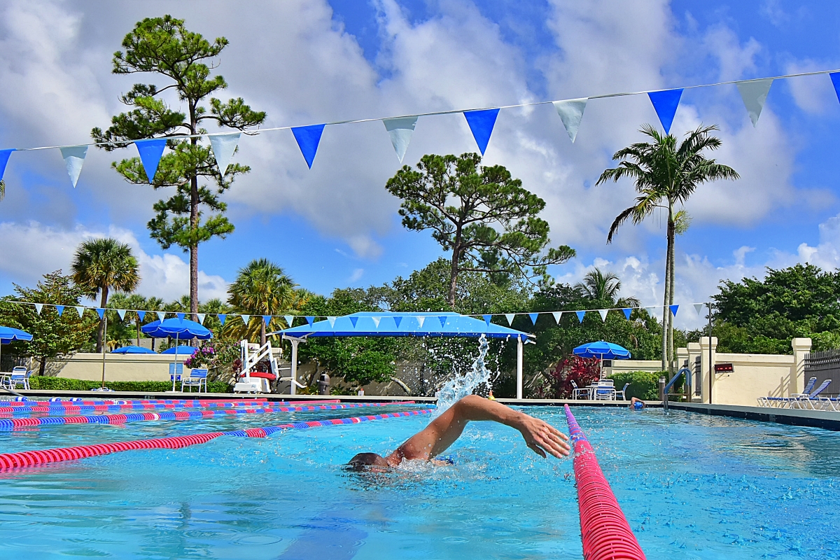 A swimmer doing laps at the Swim Center