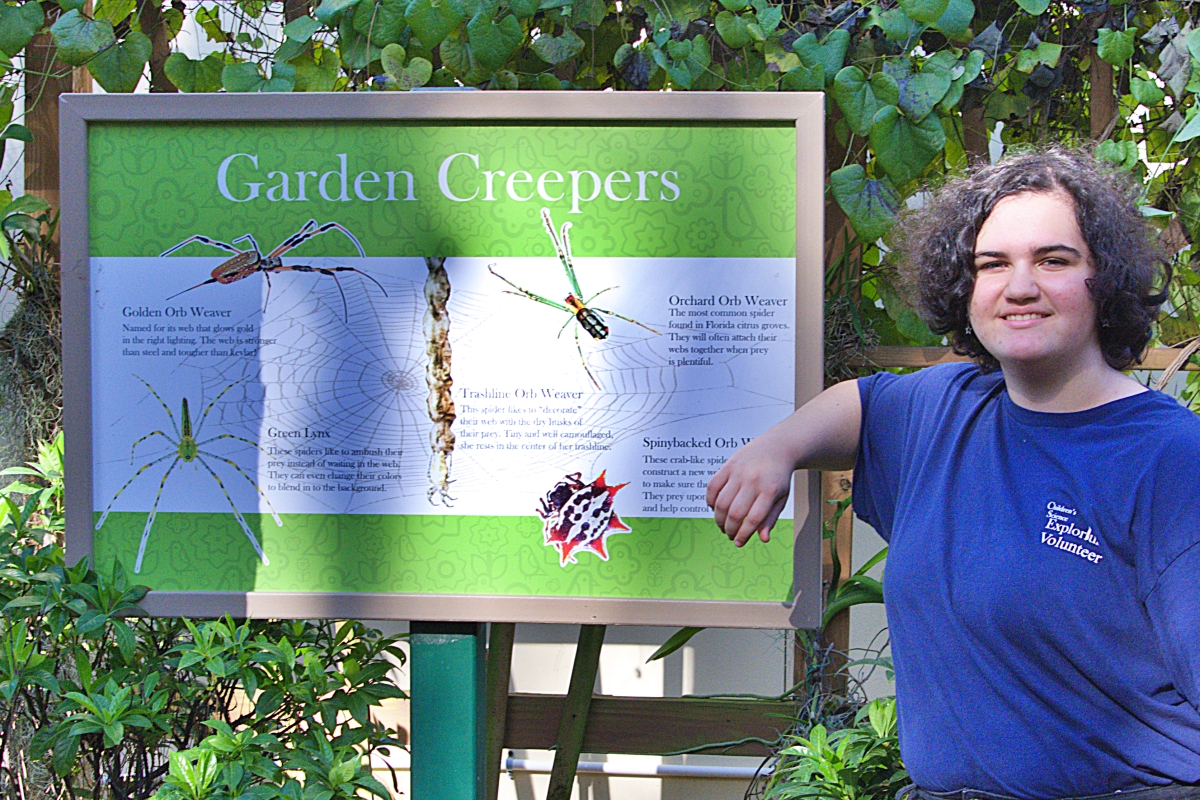 Mikaela Hill in the Sugar Sand Park Butterfly Garden