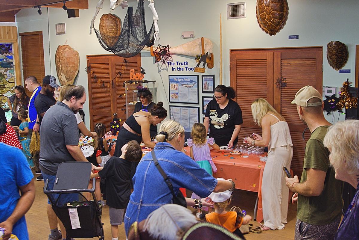 A big crowd enjoying the craft room.