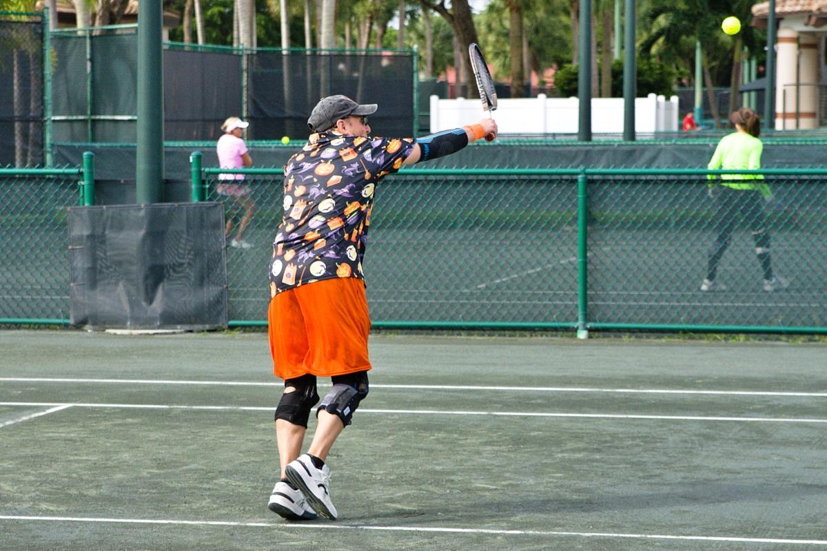 Halloween shirted tennis player